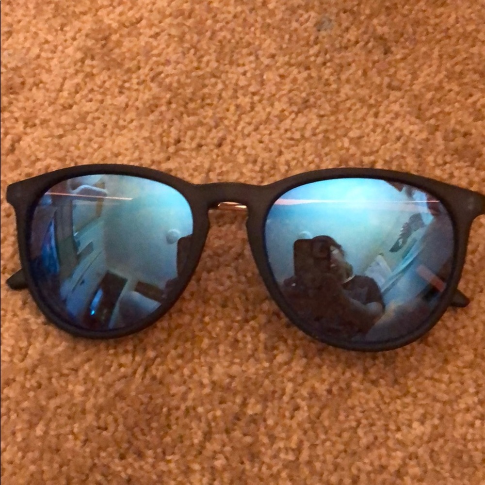Blue reflective sunglasses with black and gold